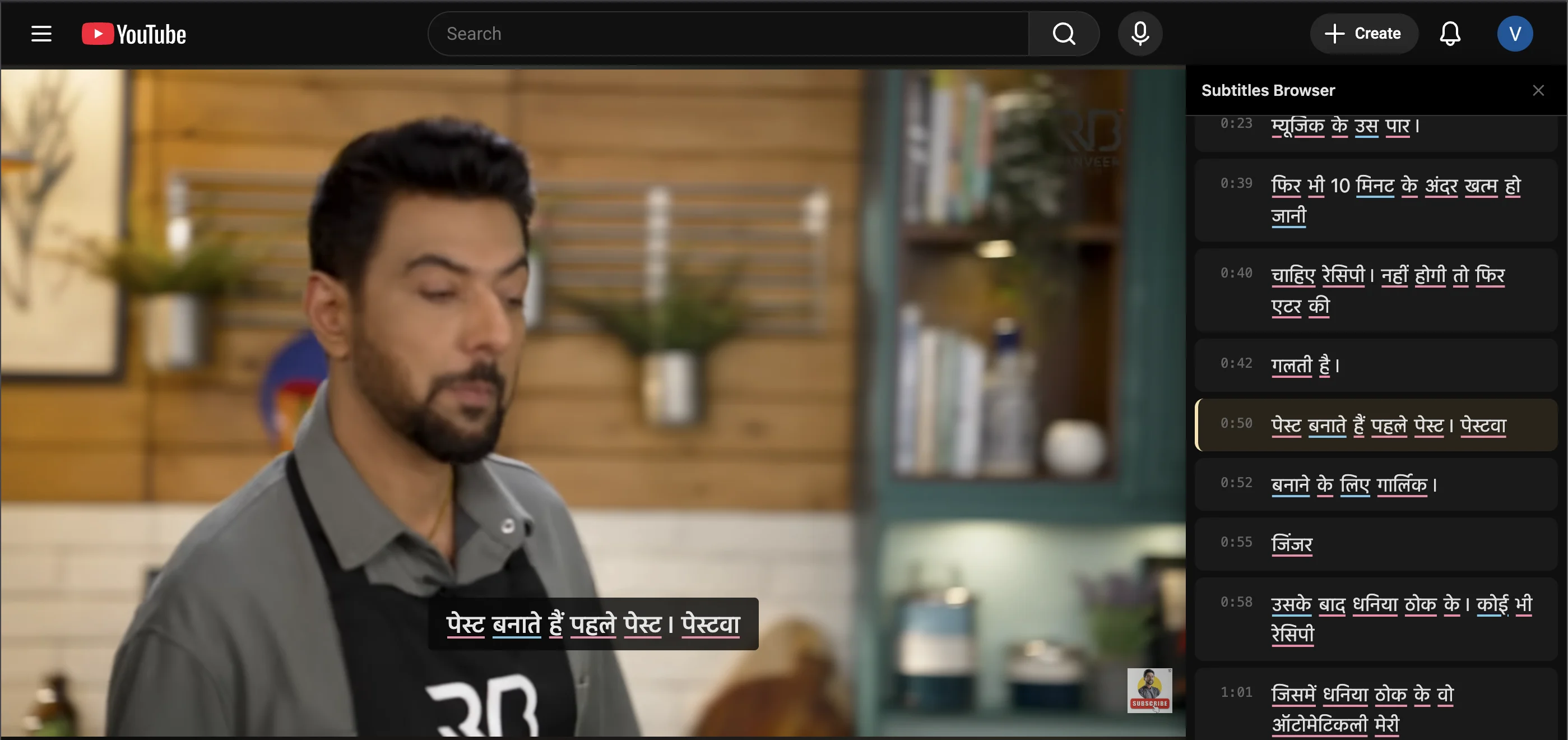 Interactive subtitle overlay on YouTube with clickable Hindi words